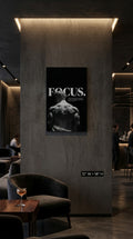 Focus motivational black and white classical statue wall art displayed in a dark modern lounge